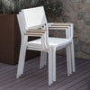 three-white-atmosphera-sunny-patio-dining-chairs-stacked | ikonitaly